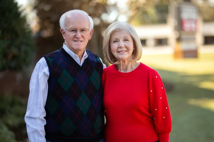 Bill and Norma Monroe standing outdoors