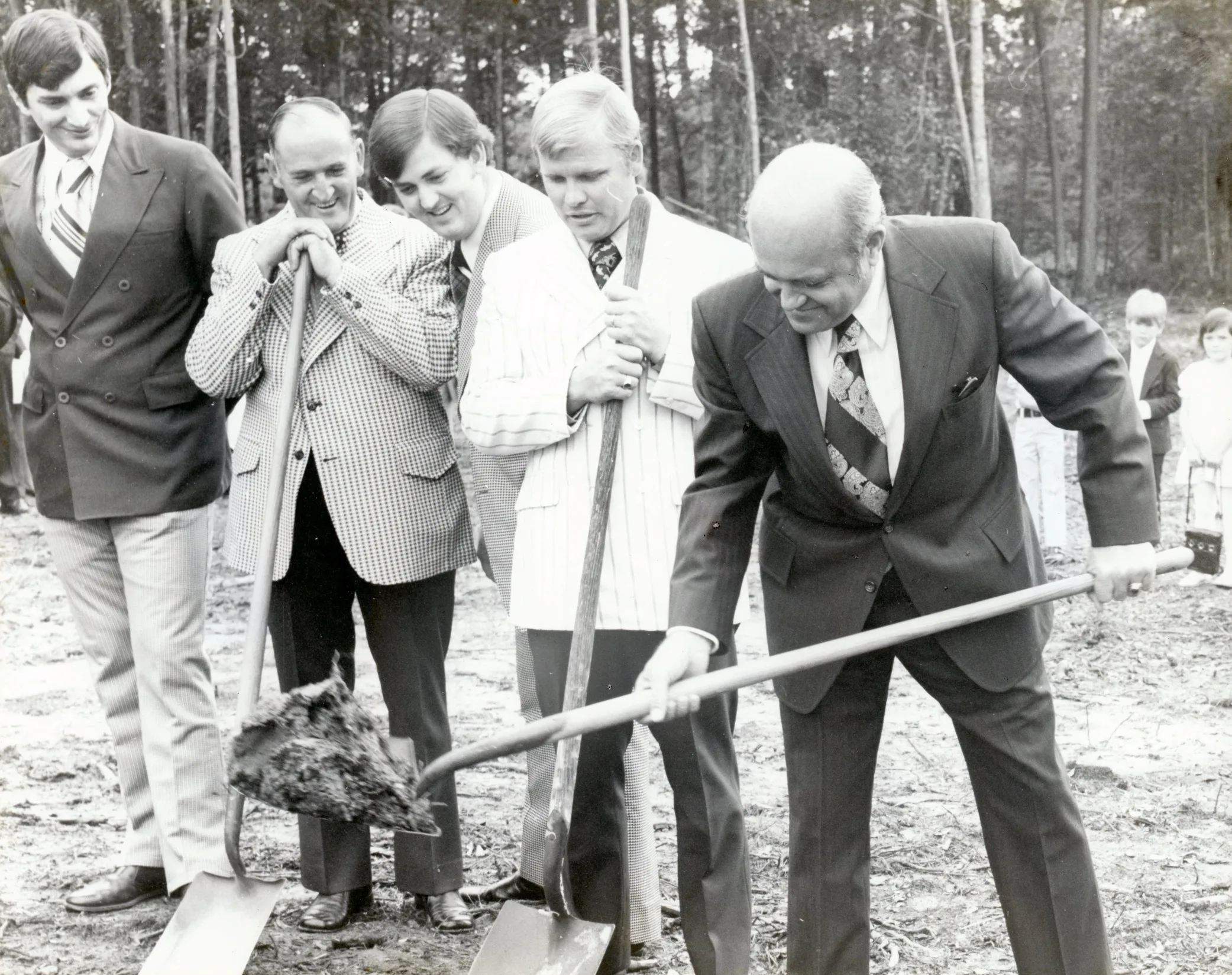Pastor Bill Monroe and church leaders breaking ground for a campus building